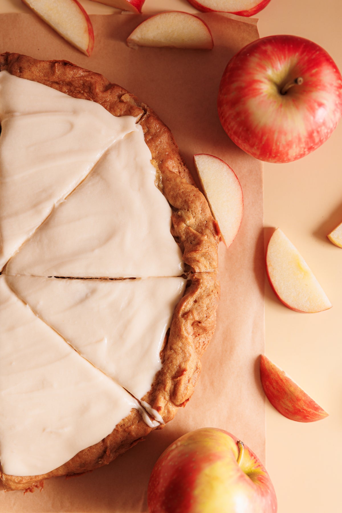 Sliced right half Caramel Me One Apple cookie pizza with caramel and apples