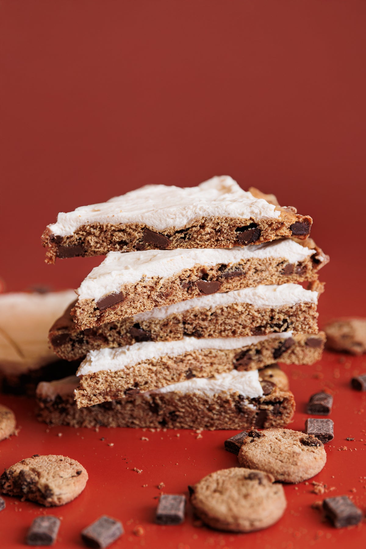 Stacked Iconic cookie pizza slices with mini chocolate chip cookies and chocolate chunks 